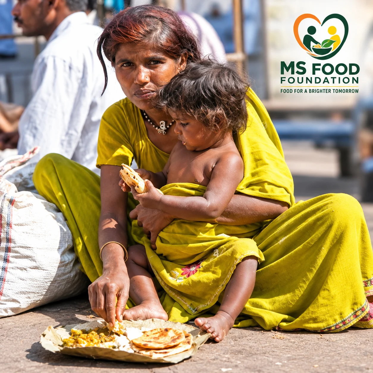 A mother and child sharing a simple meal